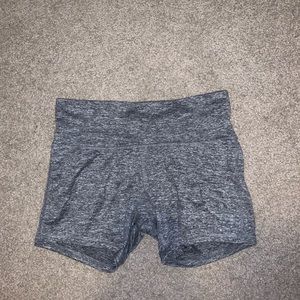 mid-waisted grey spandex shorts